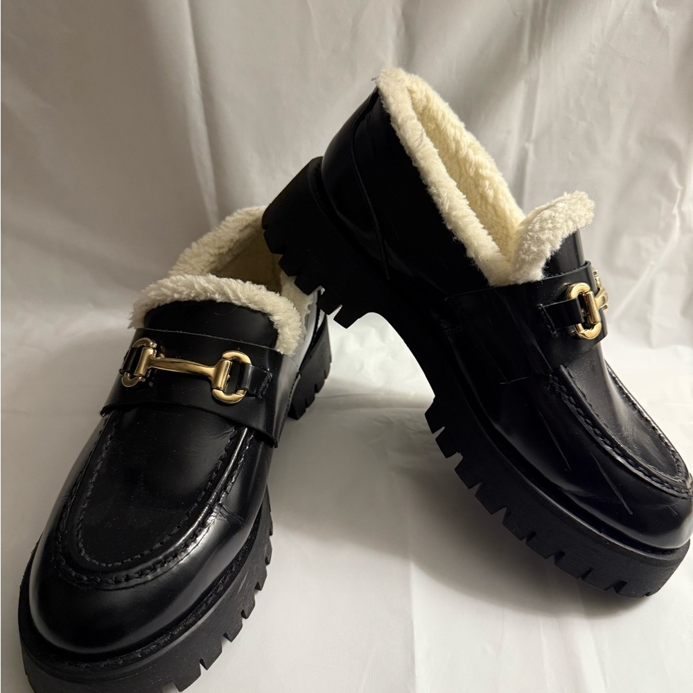 Steve Madden Black Loafers with Gold Buckle and Cream Sherpa Lining